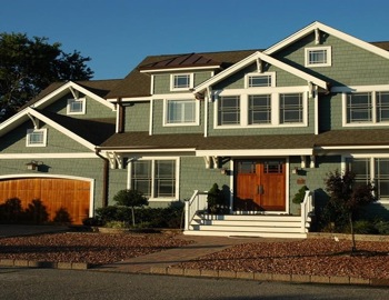 A Monetti Custom Home exterior in Point Pleasant, New Jersey. Instead of the whole exterior, focus on a niche area like entry or overhead doors. 